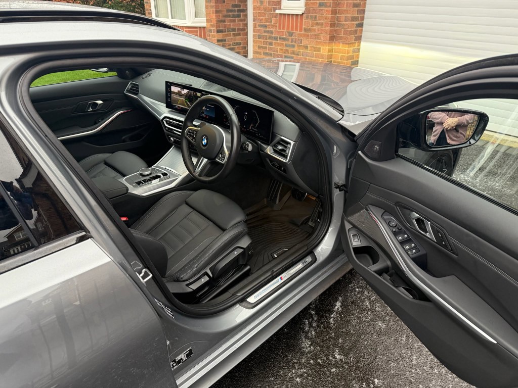 BMW 3 Series after — cabin deep cleaned and finished with clean leather seats and fresh floor mats