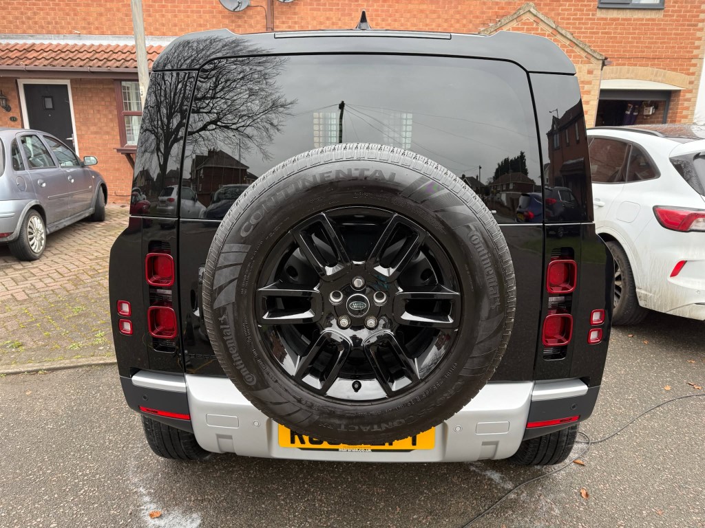 Land Rover Defender exterior after — deep gloss black finish, tyre dressed, gloss and presentation enhanced