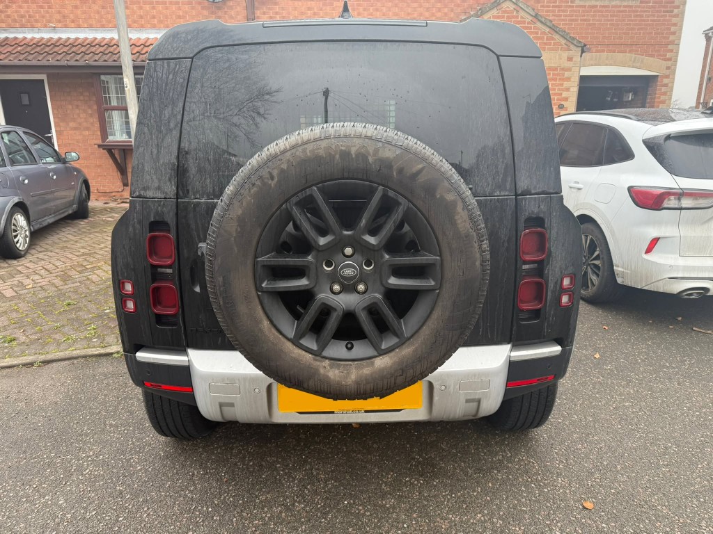 Land Rover Defender exterior before — heavily dirty, dust and grime on bodywork