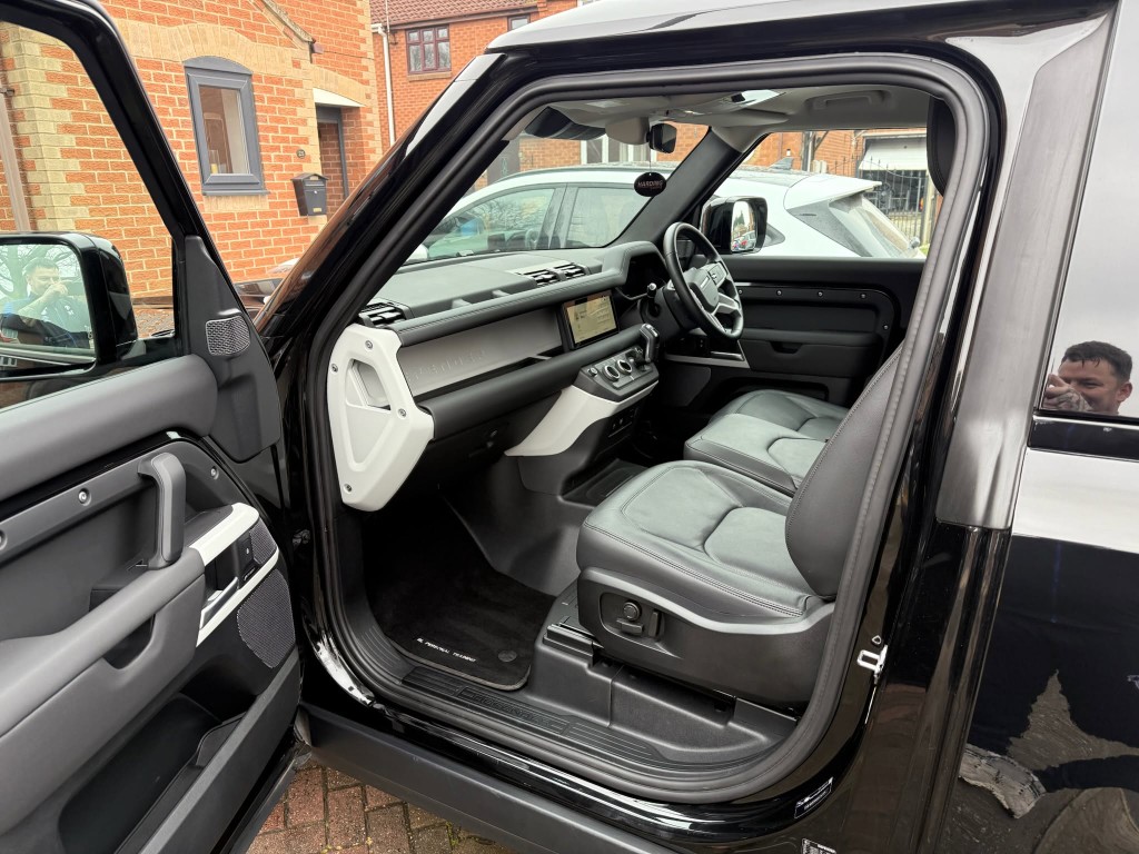 Land Rover Defender interior after — grey leather cleaned, door panel and sills deep cleaned and finished